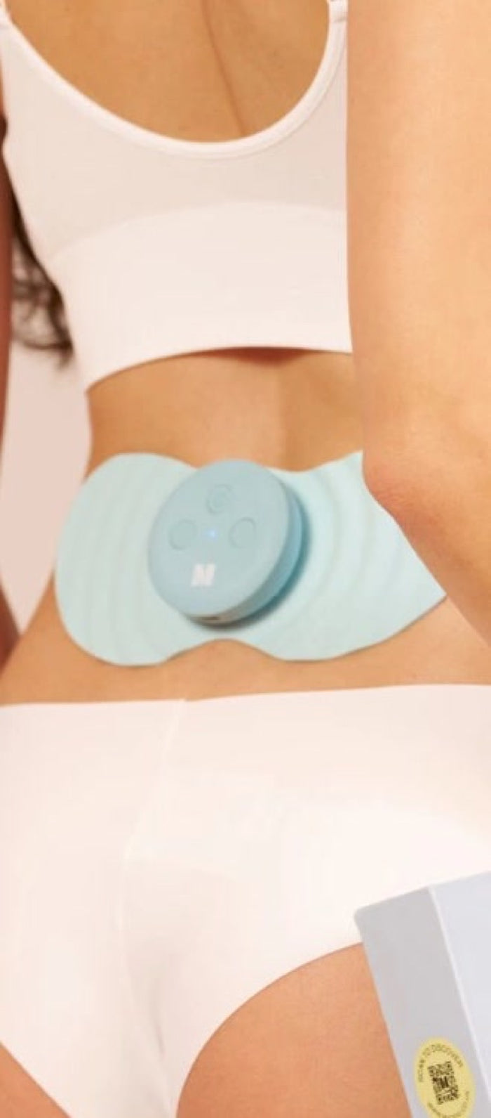 Myoovi 2.0 worn on the lower back
