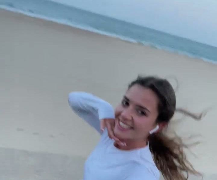 Smiling young woman out and about